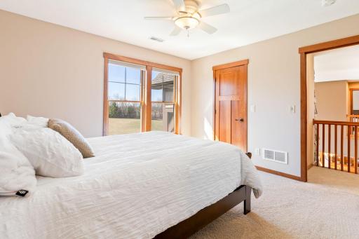 Bedroom 3 with walk in closet and electric fireplace