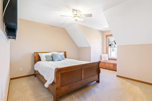 Bedroom 5 with built in bench and electric fireplace