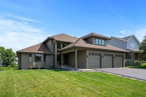 Attractive modified 2-story with brand new LP Smart siding on three sides of the home.