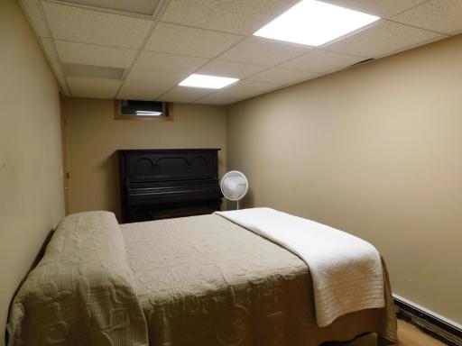 Storage room, piano came with the home. Sellers will leave it.