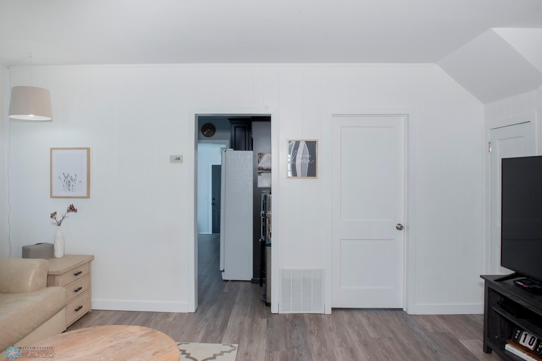 living room- leading to kitchen & main level bedroom