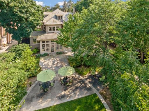 Aerial view of well landscaped private yard