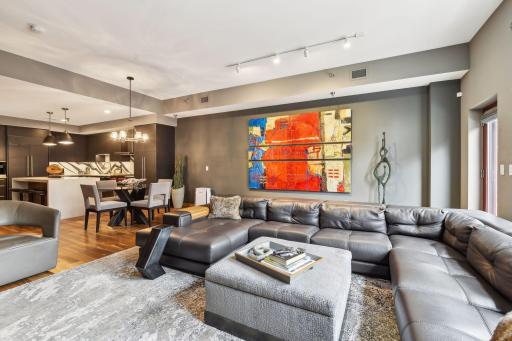 Expansive Living Room with custom furniture that is available for sale should the new owner wish.