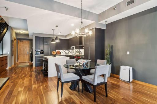 Open Dining Room is large enough to accomodate a larger table than show.