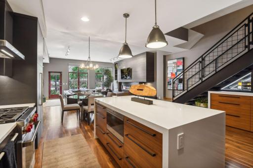 Stunning Modern Kitchen featuring the highest grade fixtures, appliances, custom cabinetry, and Cambria Quartz surfaces throughout