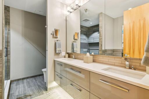 Primary Suite Bath with double sinks and Mirror Vanity Storage built-in