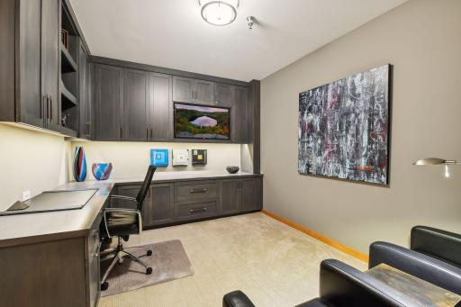 Second Bedroom with custom cabinetry built-in with flexibility to be a Home Office and large enough to accomodate a Queen bed/Sofa Sleeper/etc creating the perfect flex room