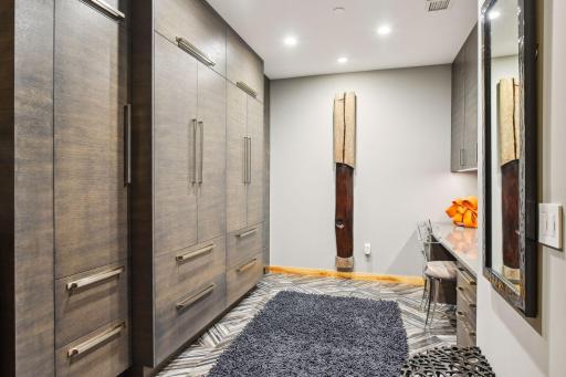 Main Level Home Office and/or additional guest space with cabinetry built-ins for Coats and Shoes and all of your storage needs