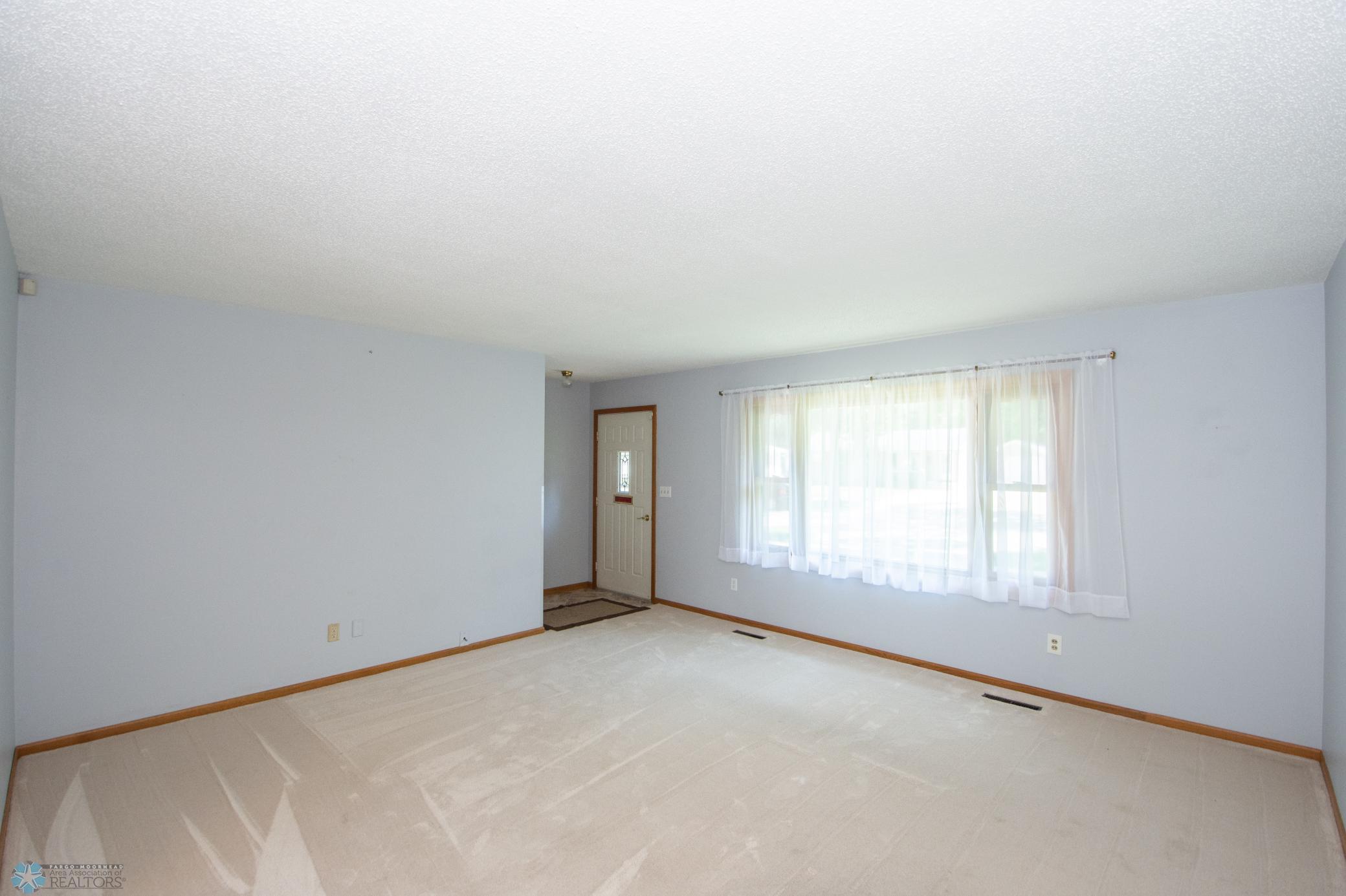 Front Entrance & Living Room