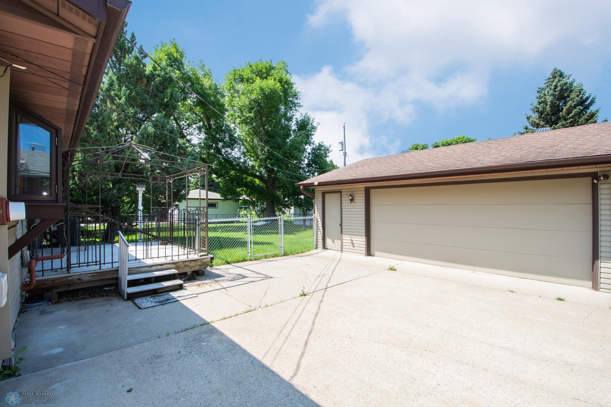 Exterior Deck & 2 Stall Garage