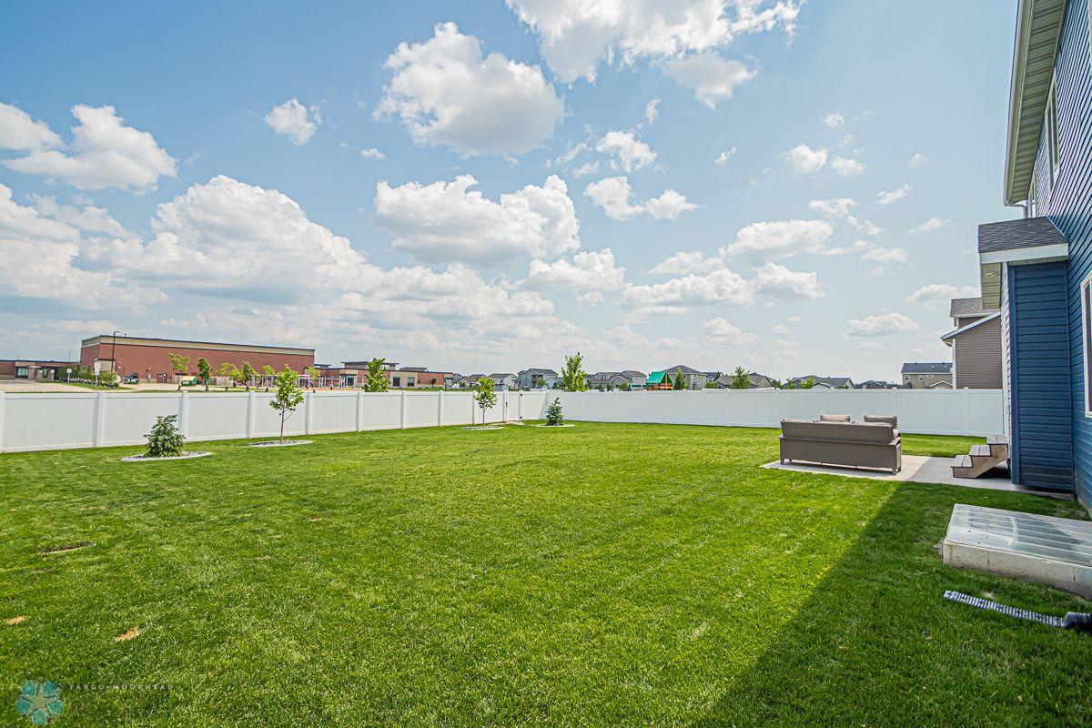 Large privacy-fenced Back yard backs to a walking path & no backyard neighbors