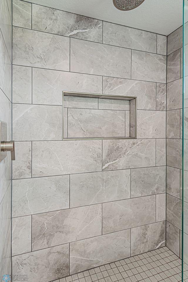 Tiled Primary SHWR includes a Rain-Shower Head