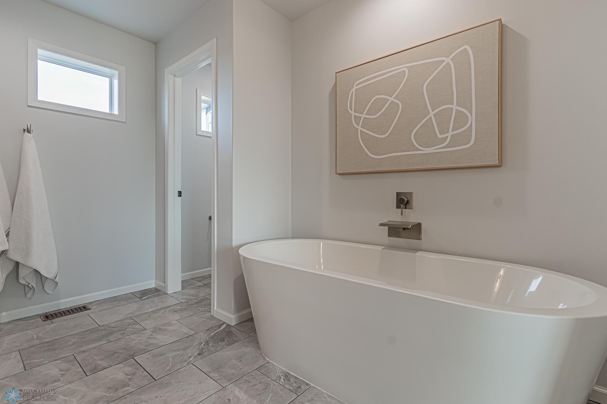 Primary Bath includes a Soaker Tub!