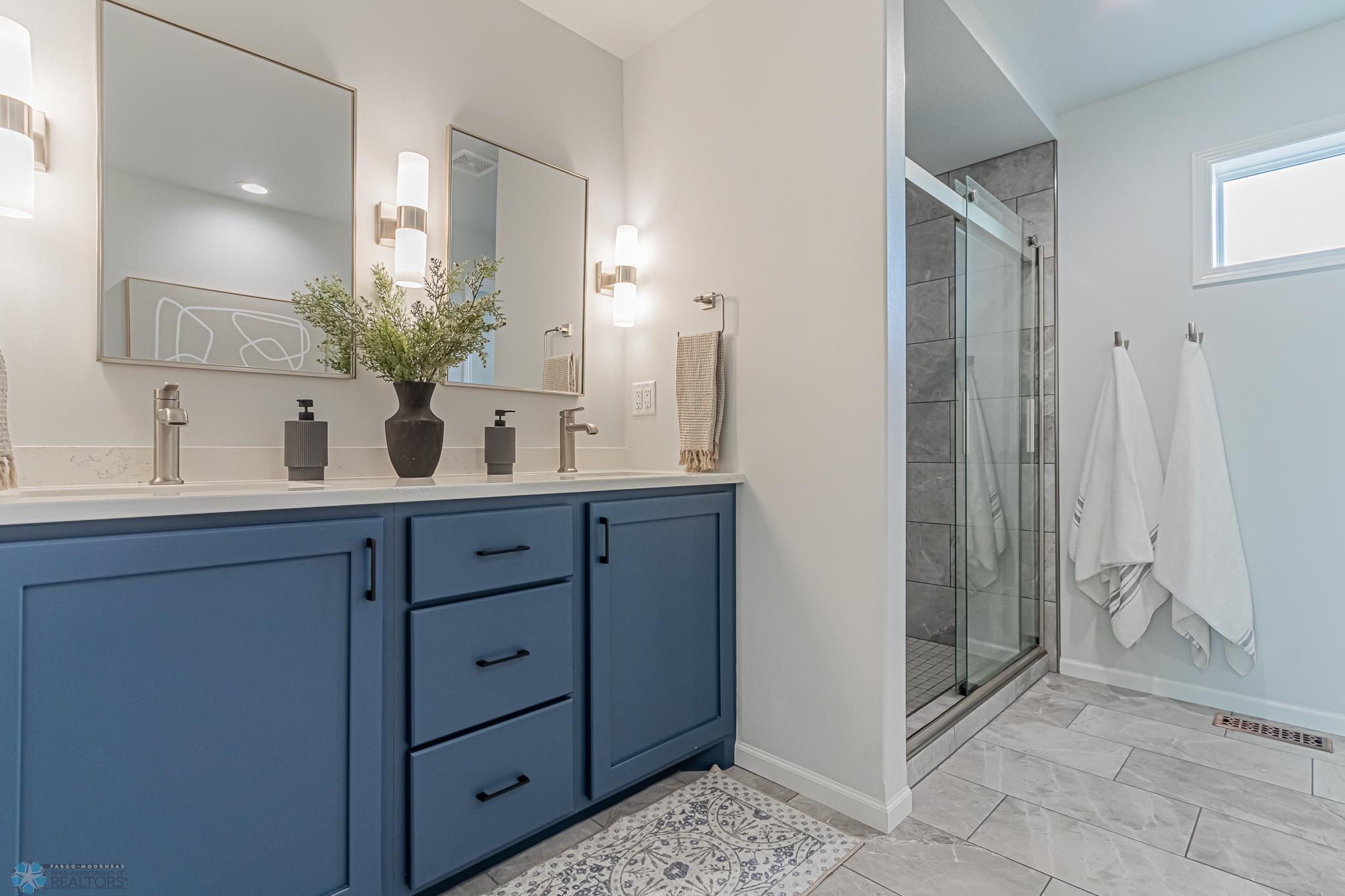 Primary Bath with DBL Sinks, Soaker Tub, Tiled SHWR, Tile Floor & Separate Toilet Area
