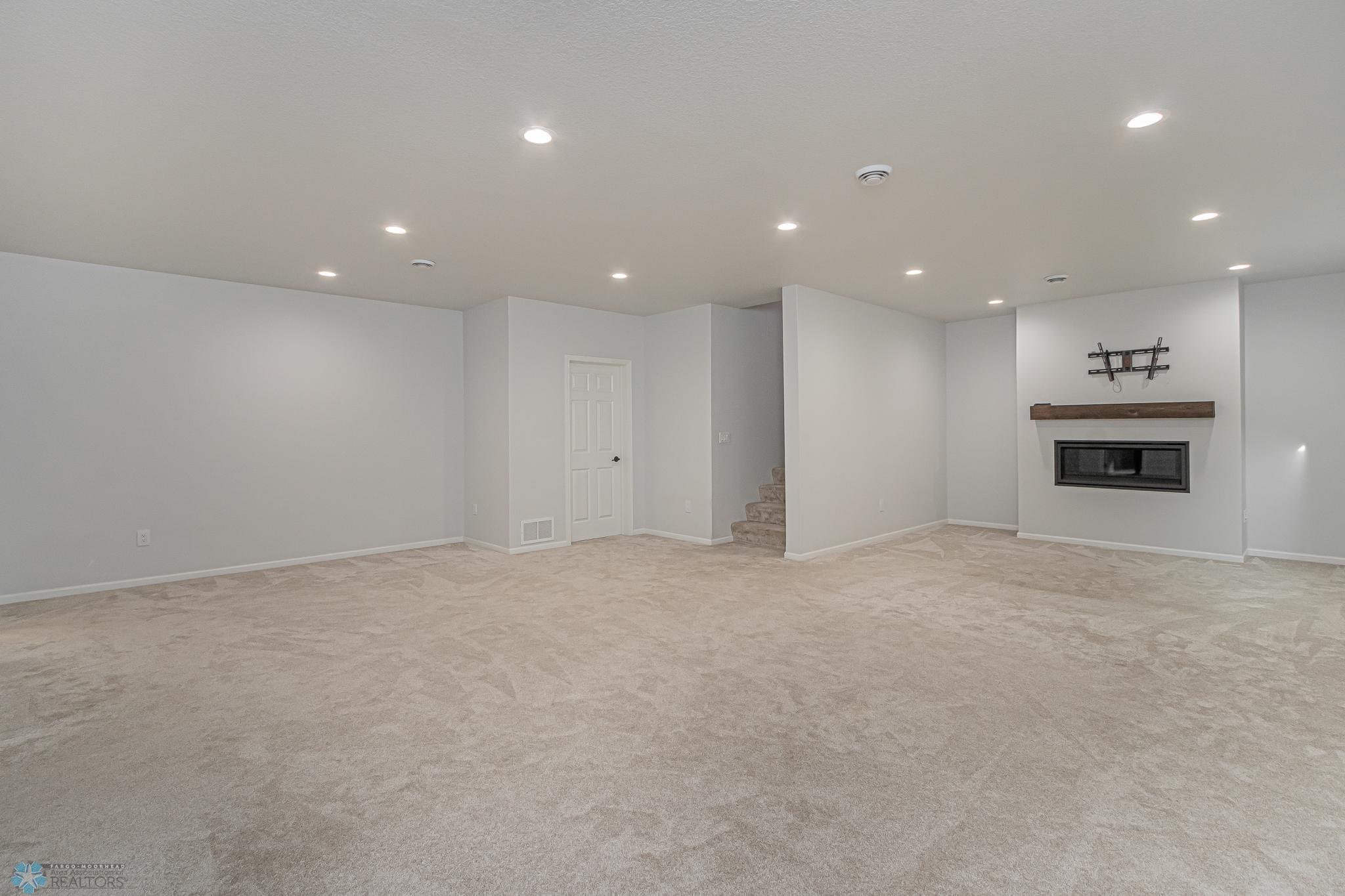 Large Basement Family Room with Gas Fireplace