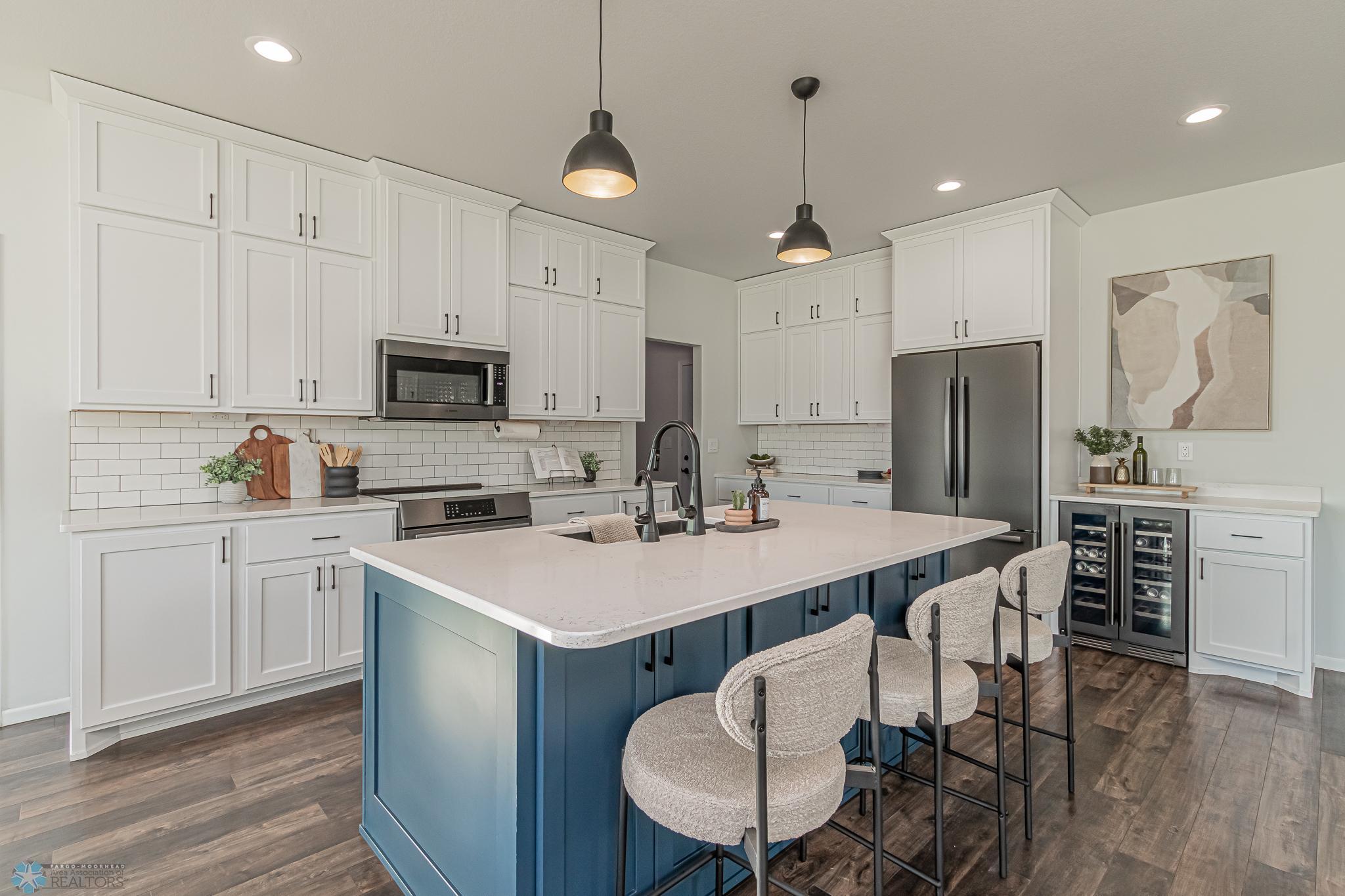 4' X 7' Island, Stainless Appliances. Beverage Frig & Vinyl Plank Flooring!
