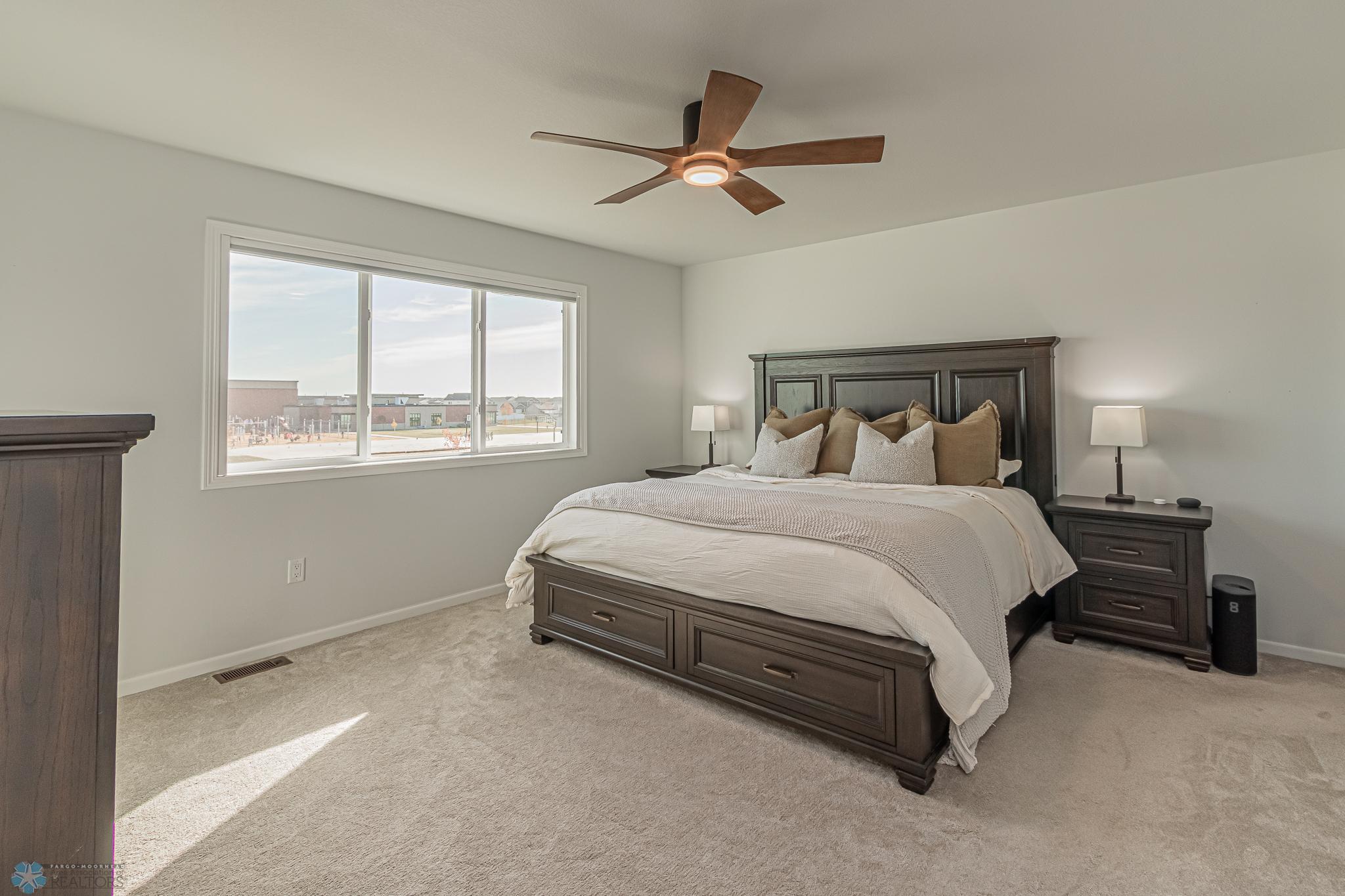 Primary Suite: WIC, Private Bath, Ceiling Fan; Cellular Shade with Remote Hub