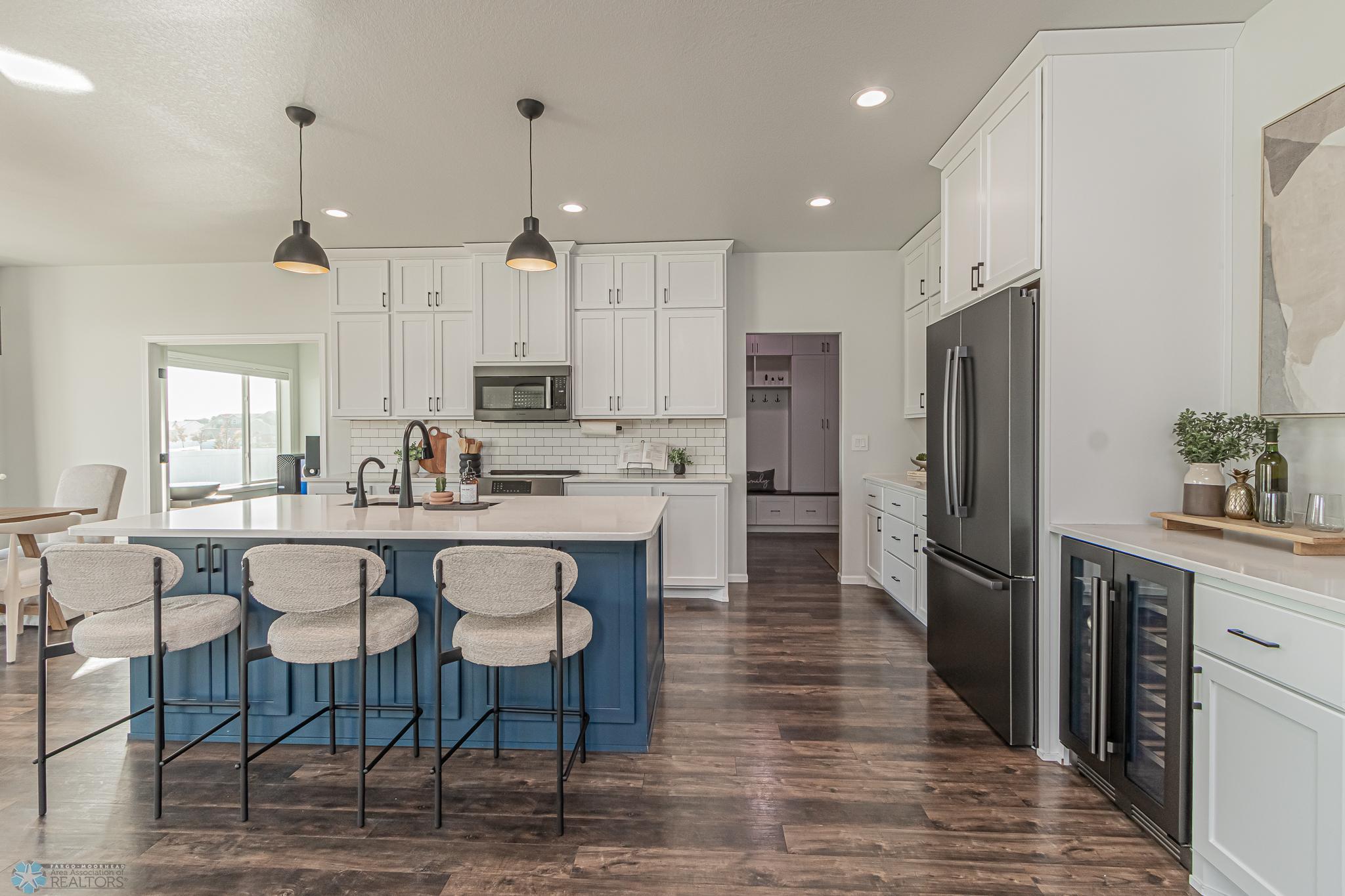 Kitchen with access to mudroom & Large Walk-in Pantry