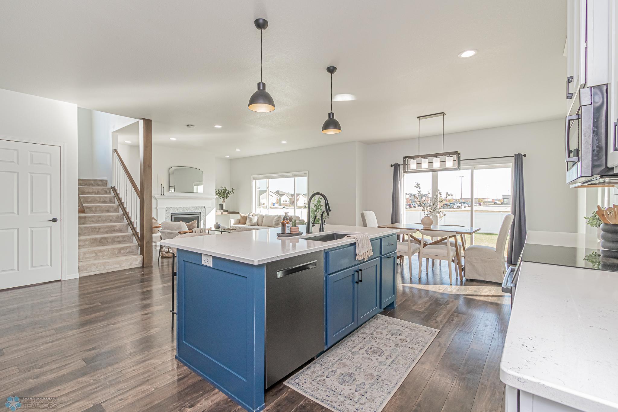 Open Floor Plan with Vinyl Plank Flooring throughout Main Floor