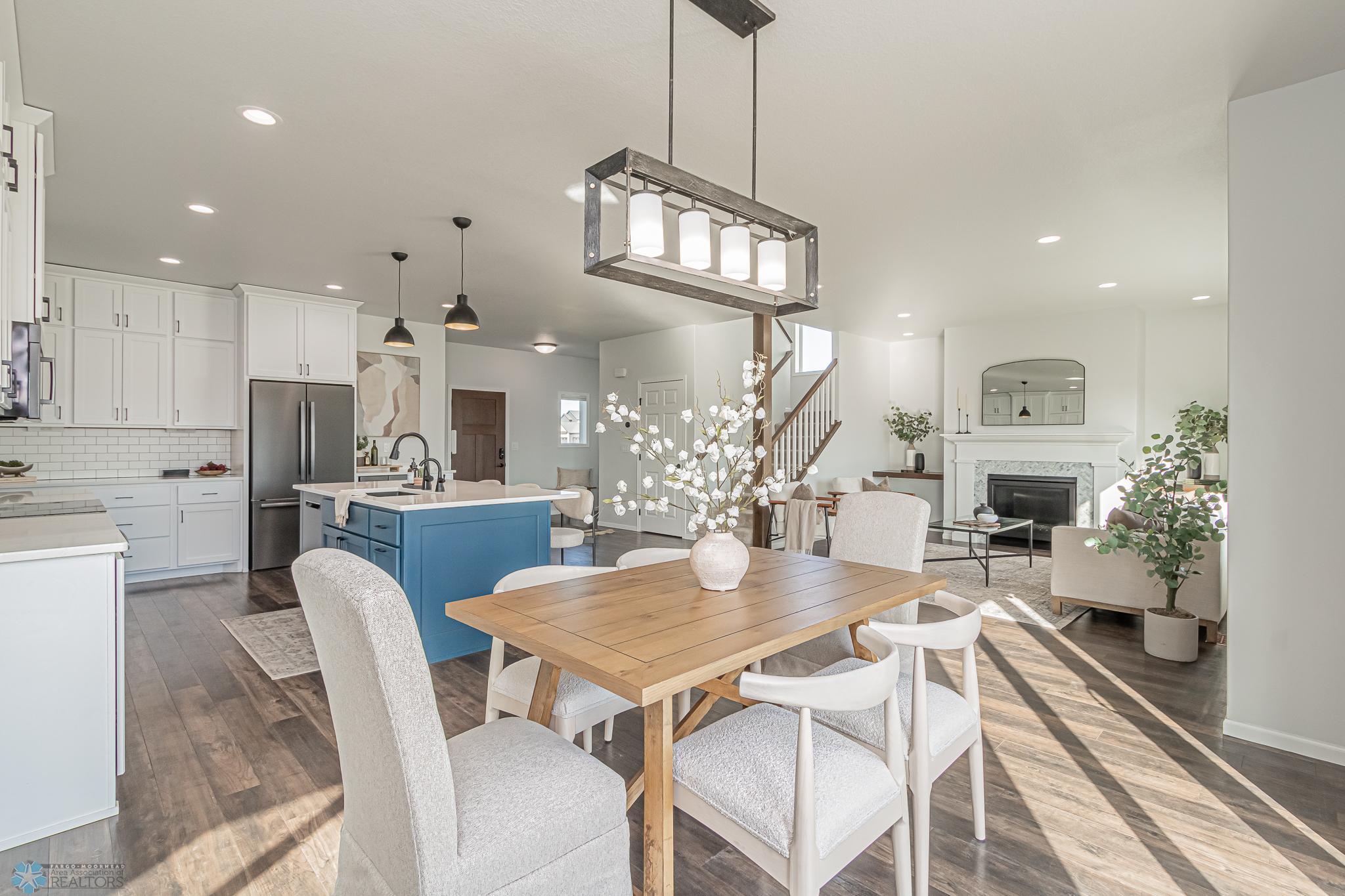 Dining Area looking to Kitchen & Living Room