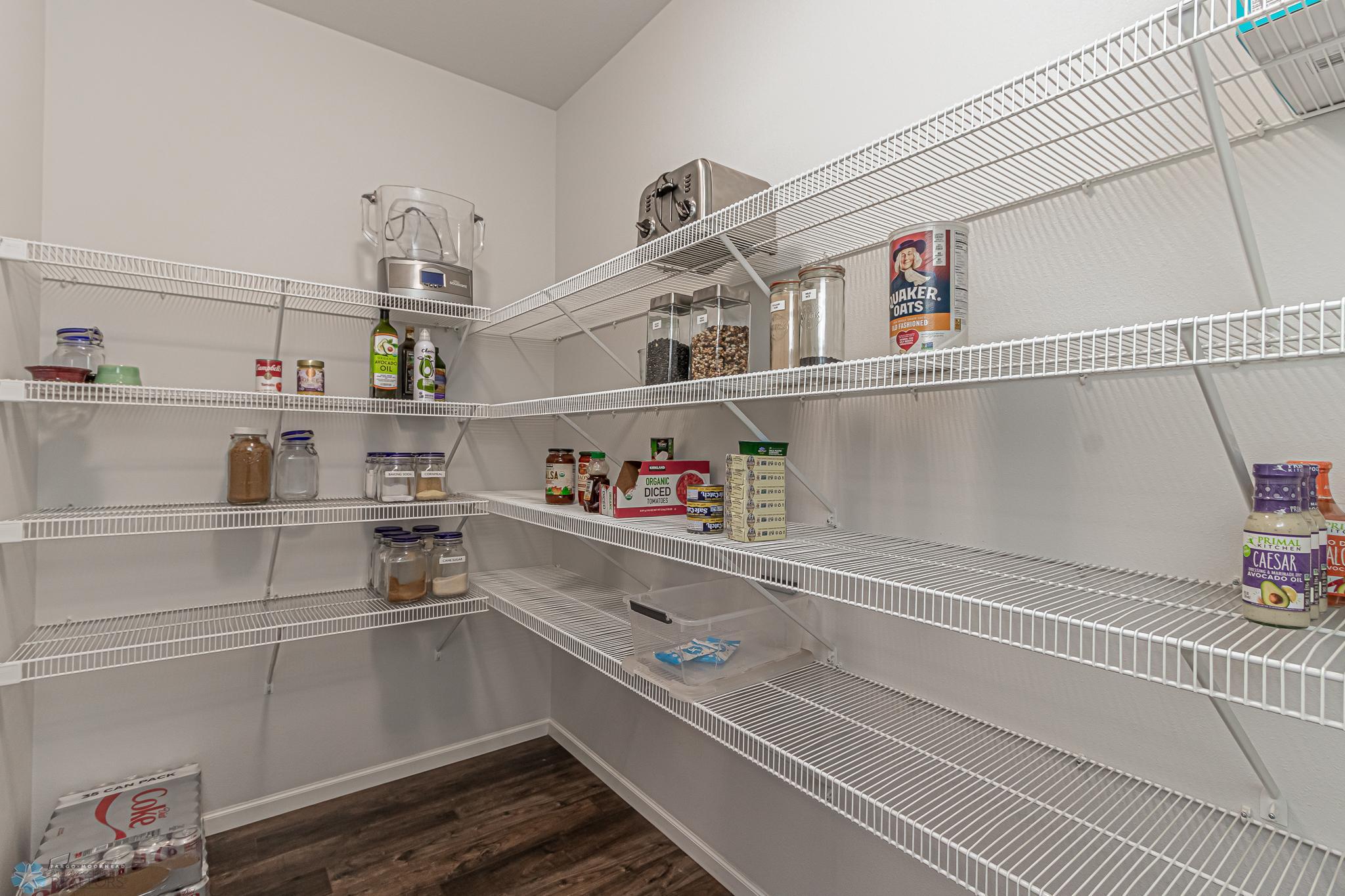 Huge Walk-in Pantry with Auto-Lighting & Pocket Door