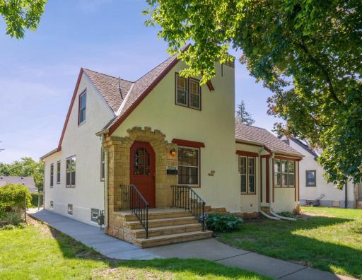 Welcome to wonderful Wentworth Avenue. This mindfully renovated Tudor surprises with bonus 3-season screened porch, soaring upper level primary suite and all spaces remodeled in 2024.
