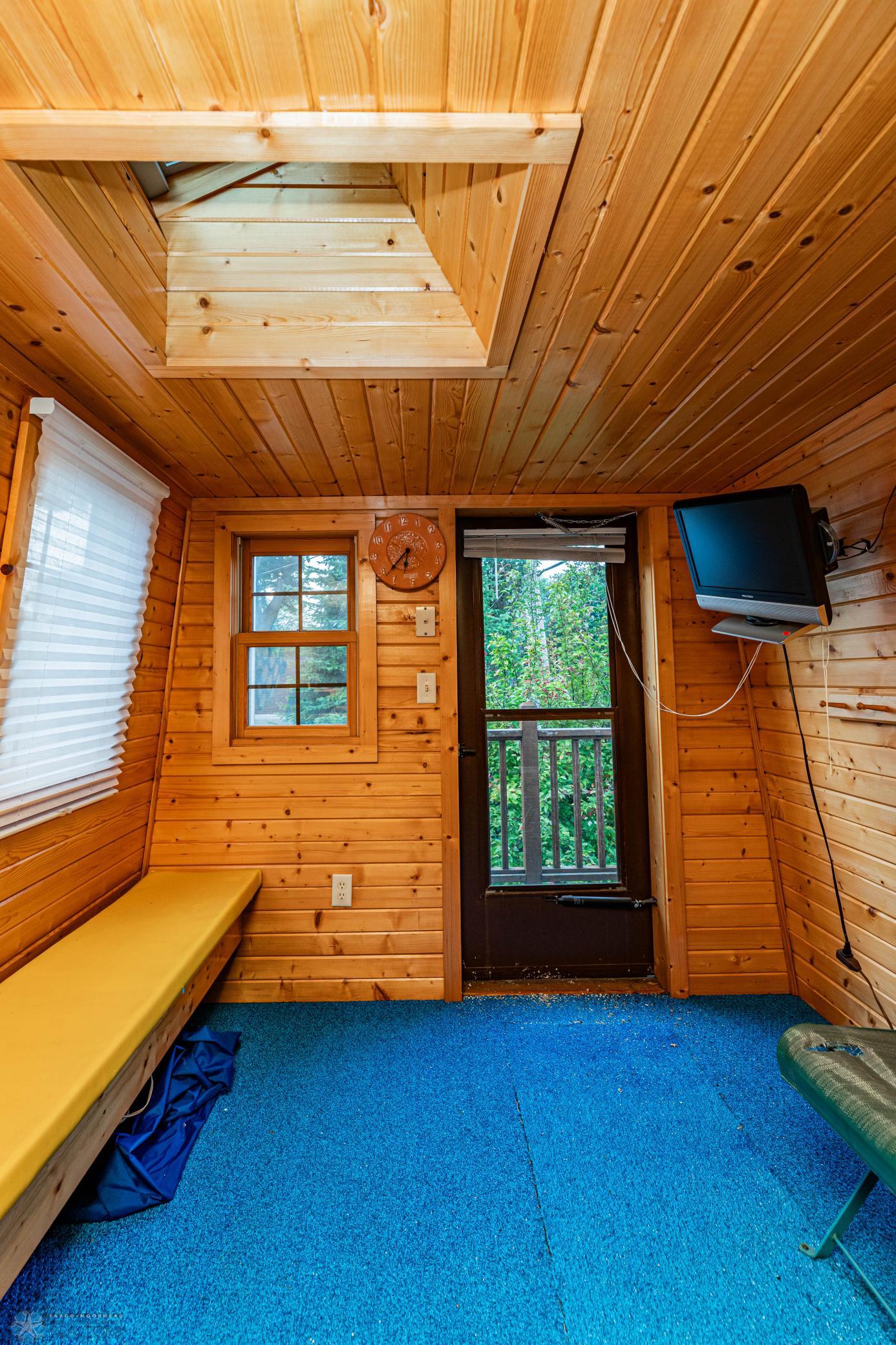 Pool House Upper Level Sitting/Door to Deck