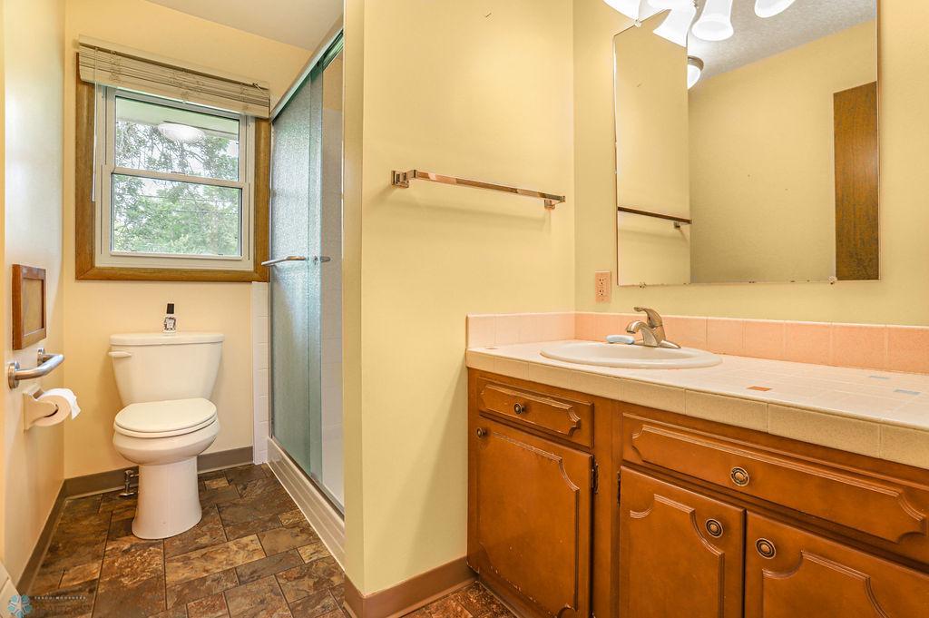 Updated shower surround and glass door!