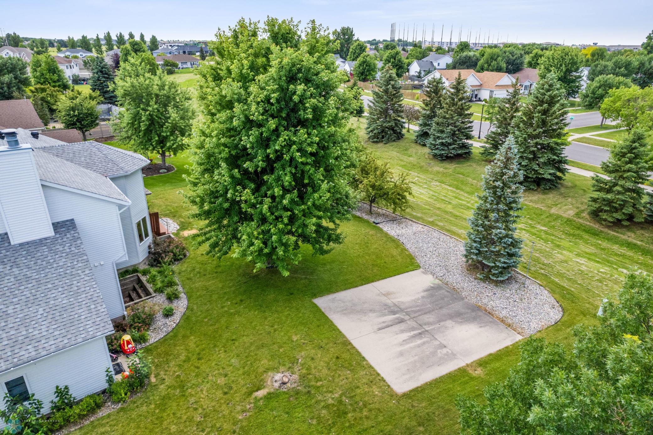 Back Yard Aerial View. Home backs to additional greenspace and recreation path