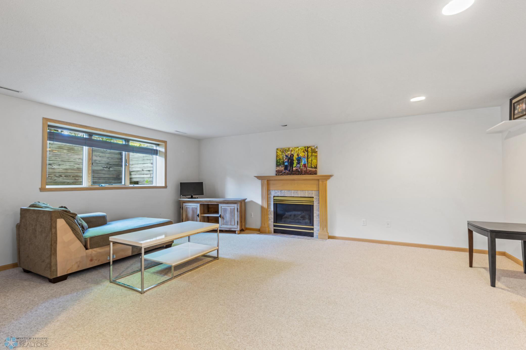 Lower Level Family Room with Gas Fireplace and Wet Bar
