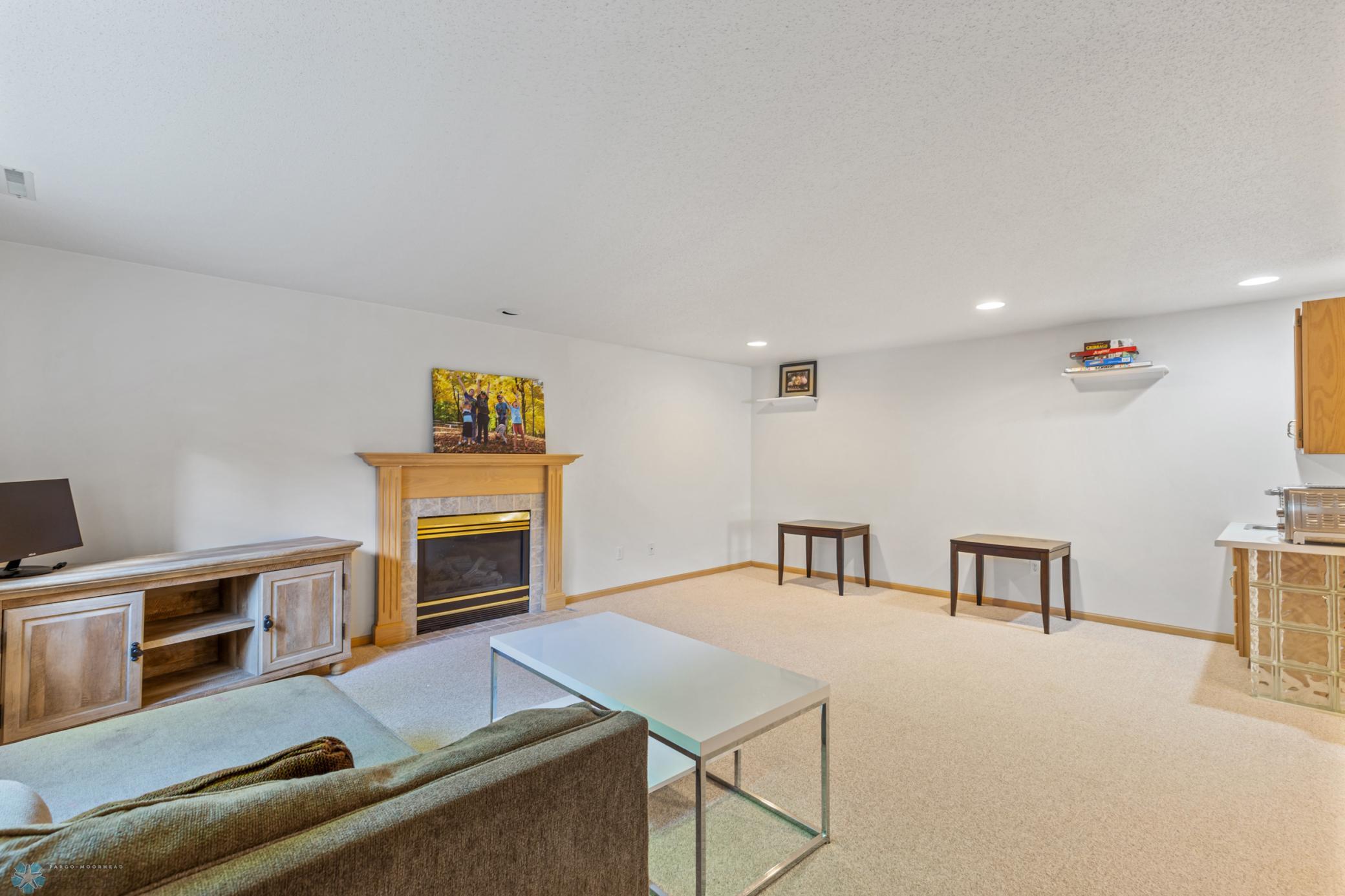 Lower Level Family Room with Gas Fireplace and Wet Bar