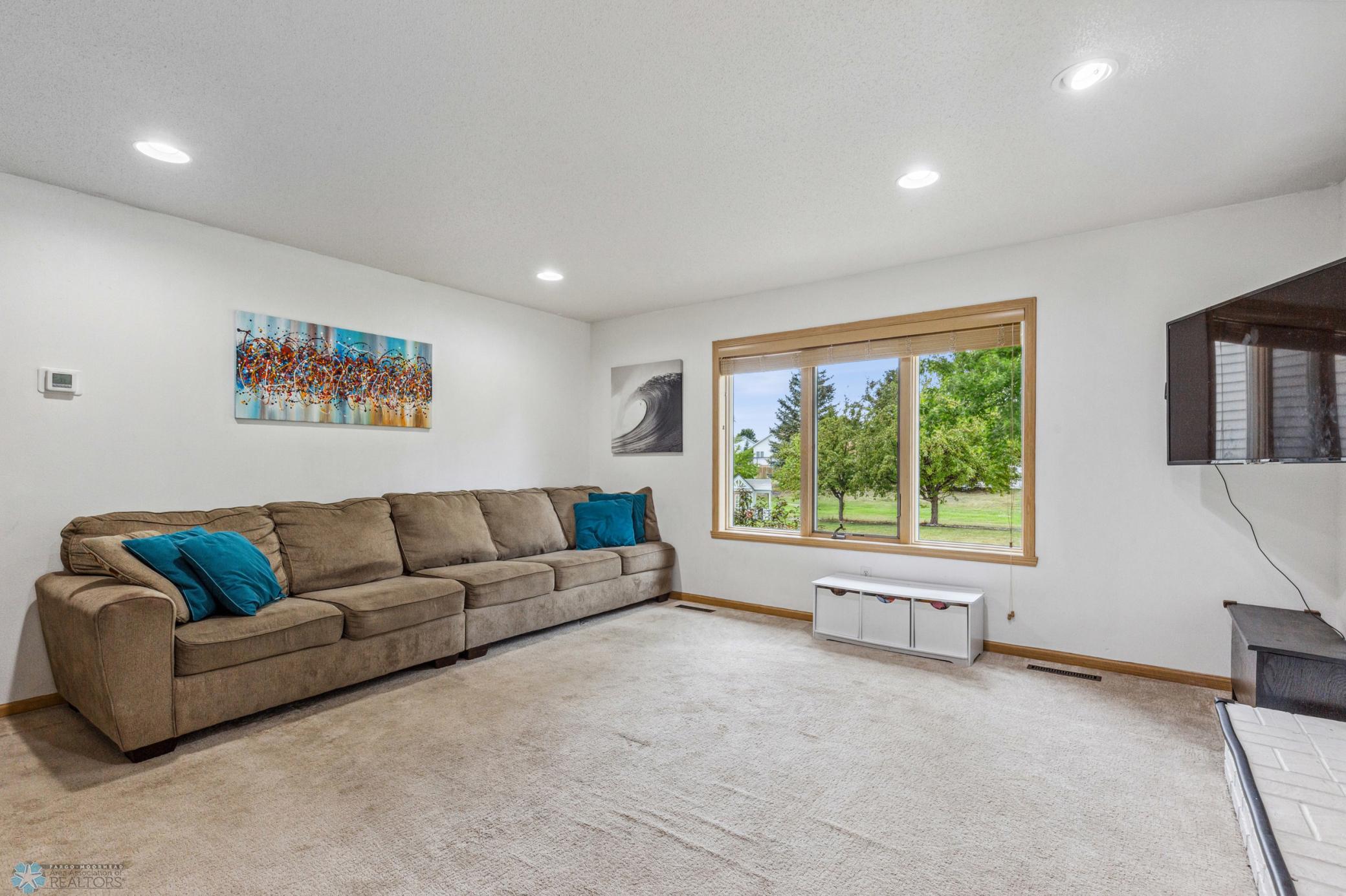 Main Floor Family Room with Wood Burning Fireplace