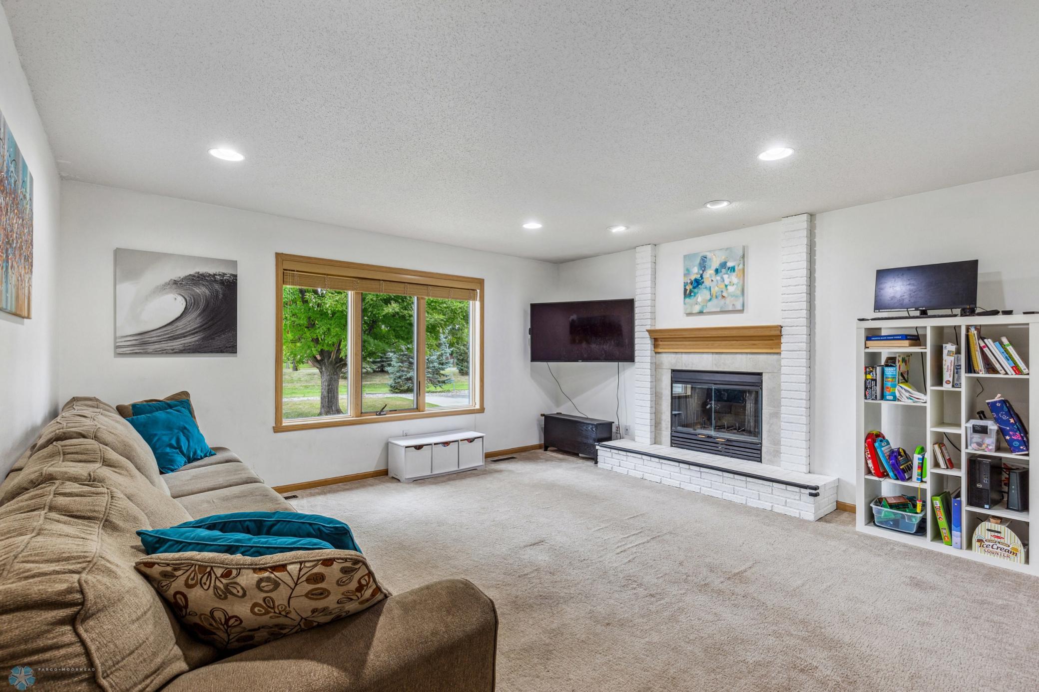 Main Floor Family Room with Wood Burning Fireplace