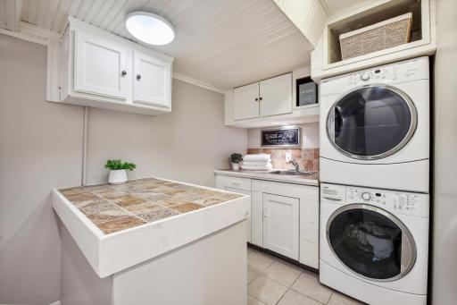 Enjoy this spacious lower level laundry room.