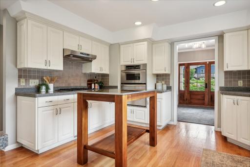 Natural light pours into the main-floor kitchen and living space.