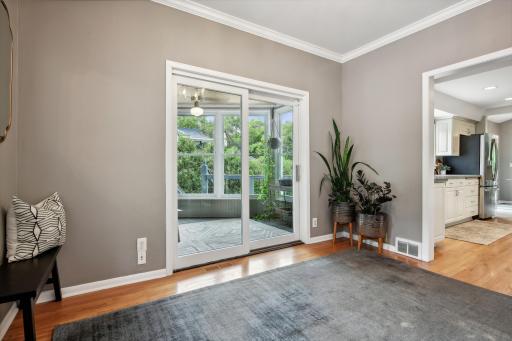 This incredible design offers a sunny bright foyer with direct access to the breezeway.
