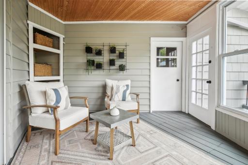 This sunny spot off the front entry acts as a breezeway to the garage and offers a tranquil space to sit and enjoy the views.