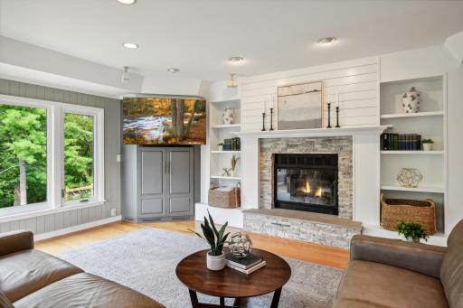 Updated fireplace and built-ins elevate this space.
