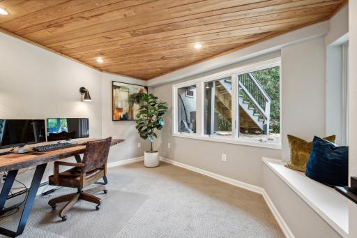 This office has amazing views of the backyard and channel.