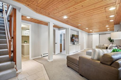 Step into the cozy lower level with additional living spaces.