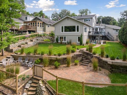 Gorgeous landscaping with multiple outdoor living areas along the water is extraordinary for the price point.