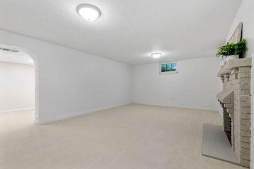 Freshly painted and new carpet in the lower level family room