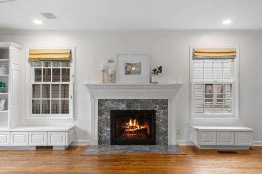 Wood burning fireplace with marble surround and hearth