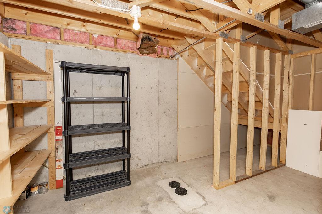 Large storage area under stairs