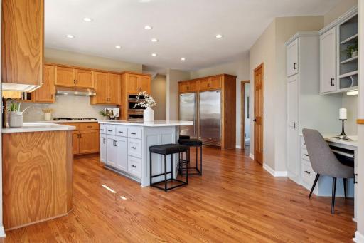 Refreshed kitchen with huge center island (new top and painted cabinets)