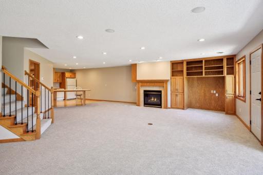 Lower level family room with gas fireplace