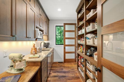 Alternate view of the walk-thru butler pantry.