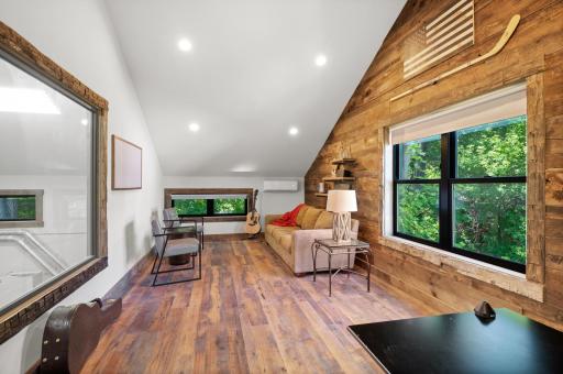 Outbuilding features an upper-level loft - great for an office!