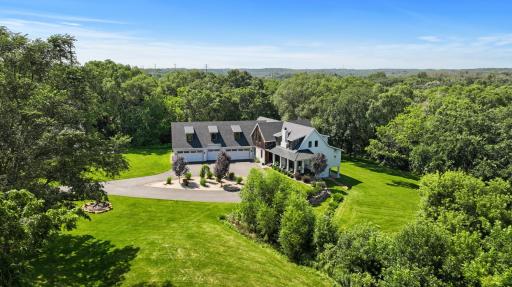 The property's natural beauty is nothing short of amazing, featuring walking and 4-wheeler trails in the north acreage.