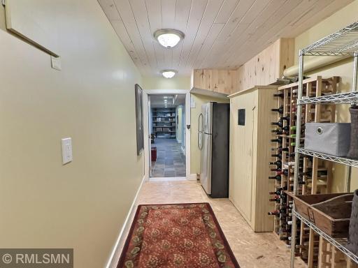 The side 'foyer' is entered through an outside access, ideal to shower off or use the bathroom from the lake.